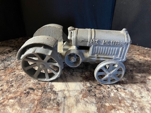 Vintage mccormic deering cast - mccormic,